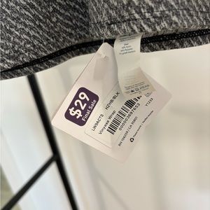 Never used Lulu neck wrap. Tags still on.